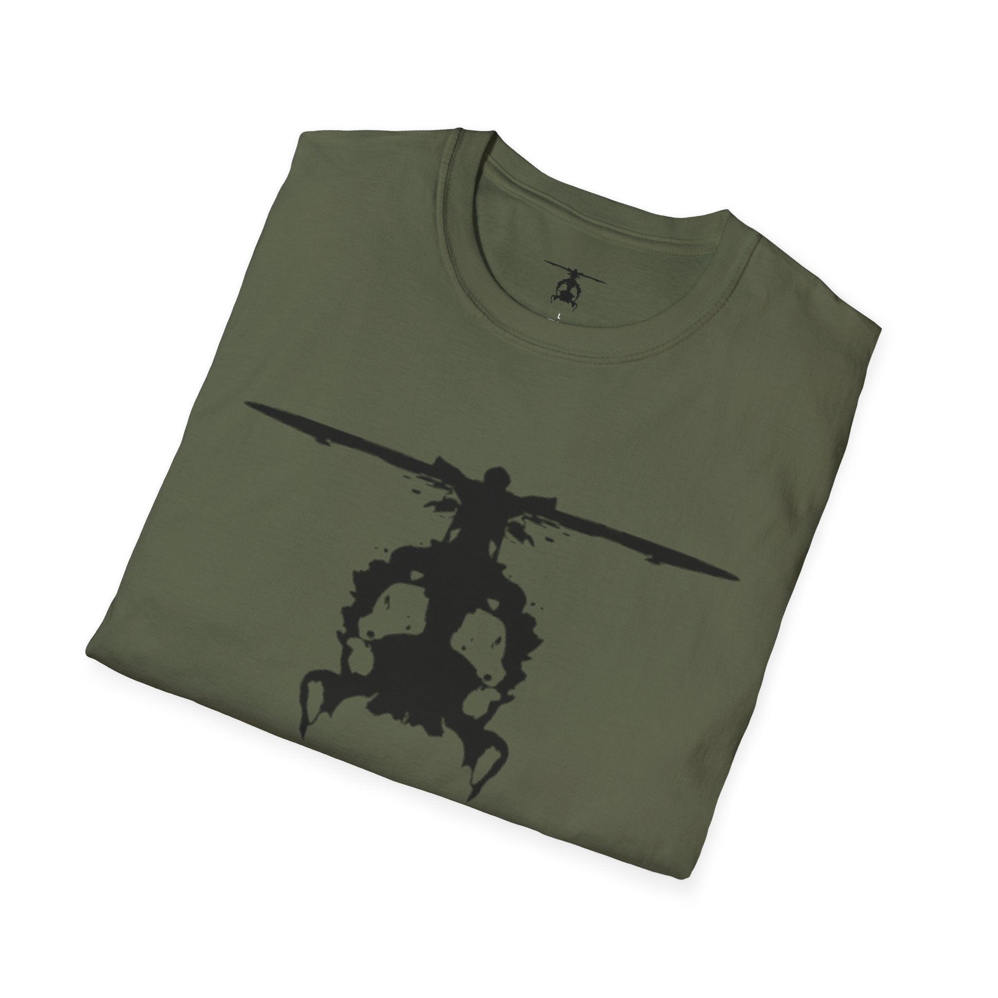 Folded green T shirt with an inkblot helicopter design on a white background