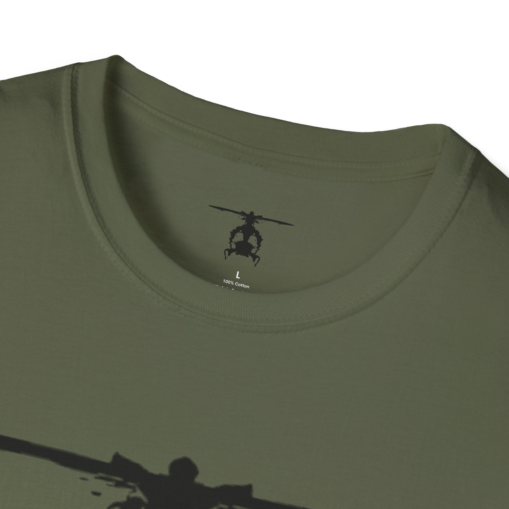 Green T shirt with an inkblot helicopter design on a white background