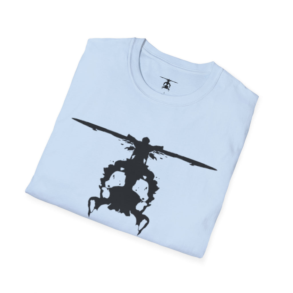 Folded light blue T shirt with an inkblot helicopter design on a white background