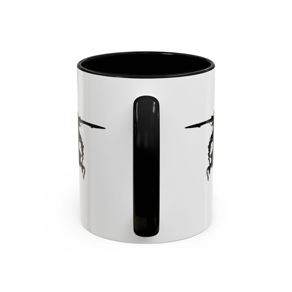 White mug with black handle and interior, featuring a black inkblot helicopter design on a white background