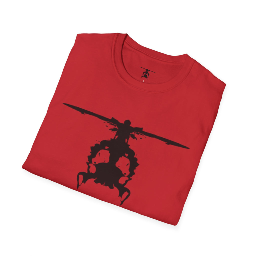 Folded red T shirt with an inkblot helicopter design on a white background